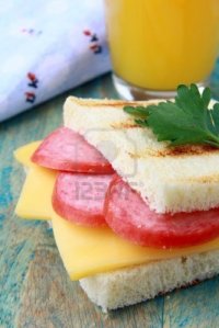 9427327-breakfast-sandwich-with-cheese-and-salami-and-juice